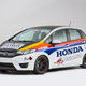Illustration for article titled A Honda Fit With A Grom In The Back Is Something We Need Yesterday